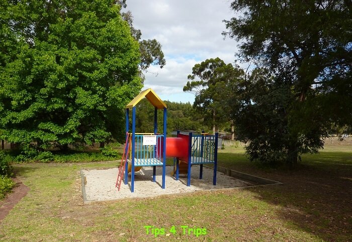 A kids playground suitable for young children is at the Diamond Forest Cottages farm stay near Pemberton, Western Australia
