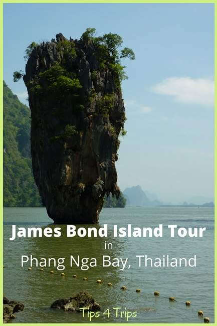 Text overlay "James Bond Island Tour in Phang Nga Bay" narrow limestone island in bay
