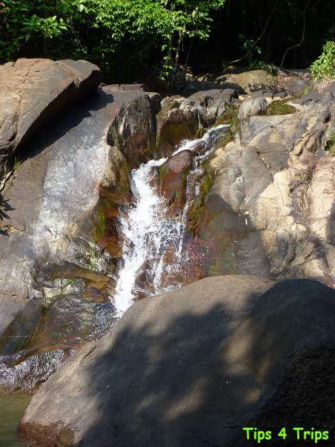 A waterfall trickling with water near Khao Lak at the end of the dry season