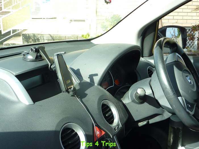 Mobile phone mount on dash of car to stay safe on the road