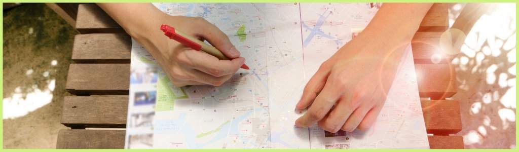 Person looking at map planning a trip