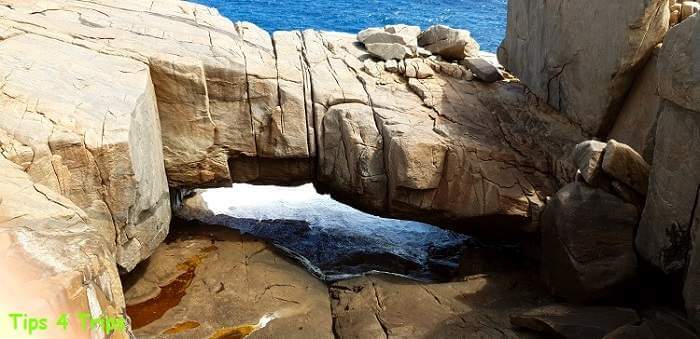 The rocky formation of a bridge forming the Torndirrup attraction of Natural Bridge