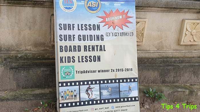 A sign for the surf school on Legian beach