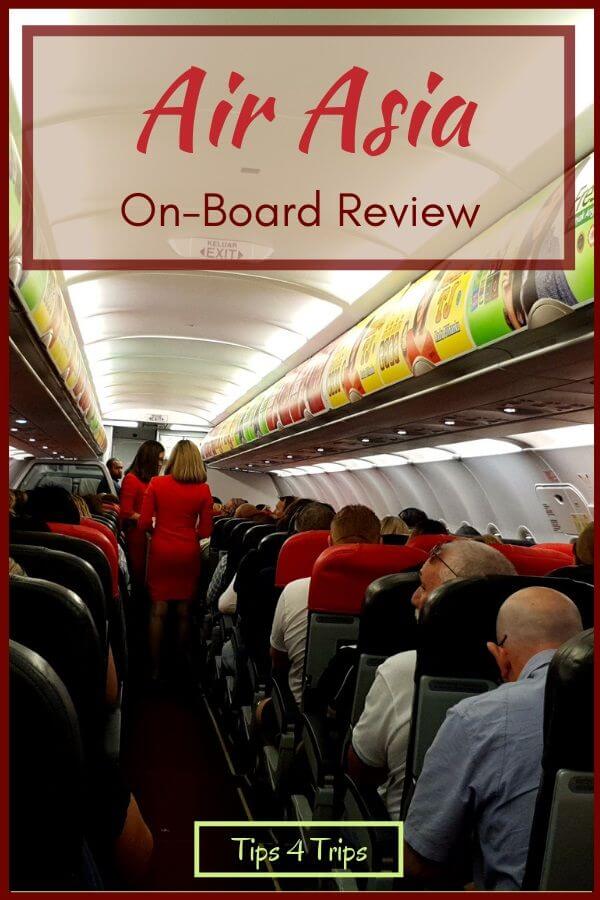Interior of Air Asia A320 plane with text overlay Air Asia on-board review