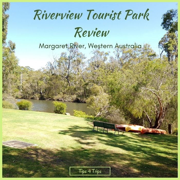 The riverfront at Riverview Tourist Park in Margaret River. with large green grass area looking across the river to forest