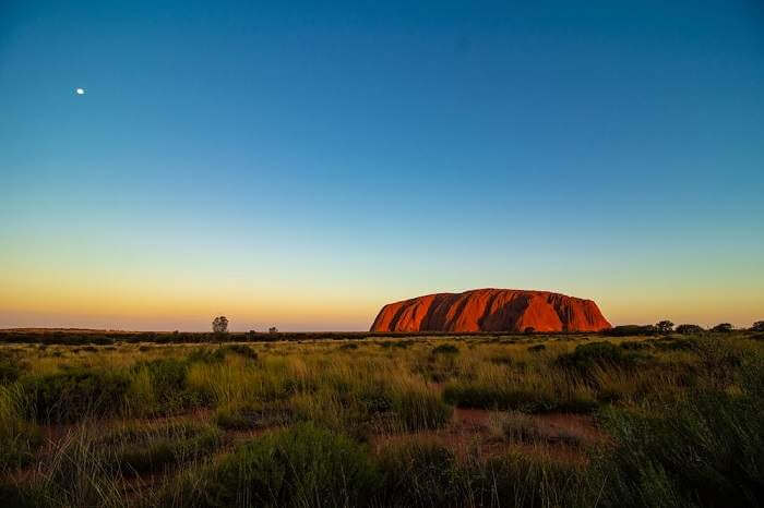 The large orange rock in the middle of Australia known as Uluru