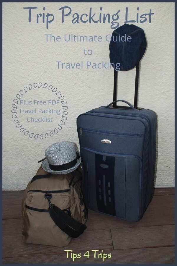 blue wheely suitcase and beige carry all with hat on top with text overlay trip packing list