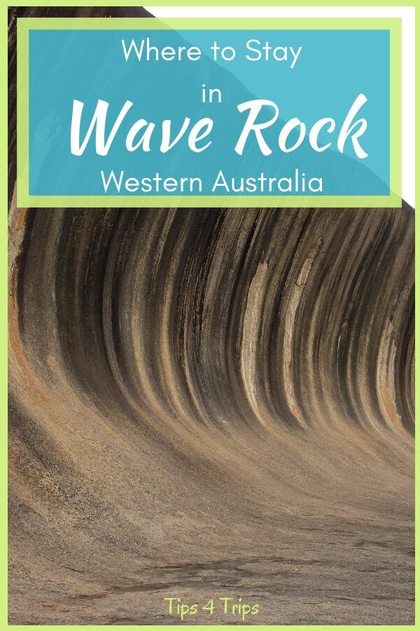 the striated colours on wave rock with text overlay, where to stay in wave rock western australia