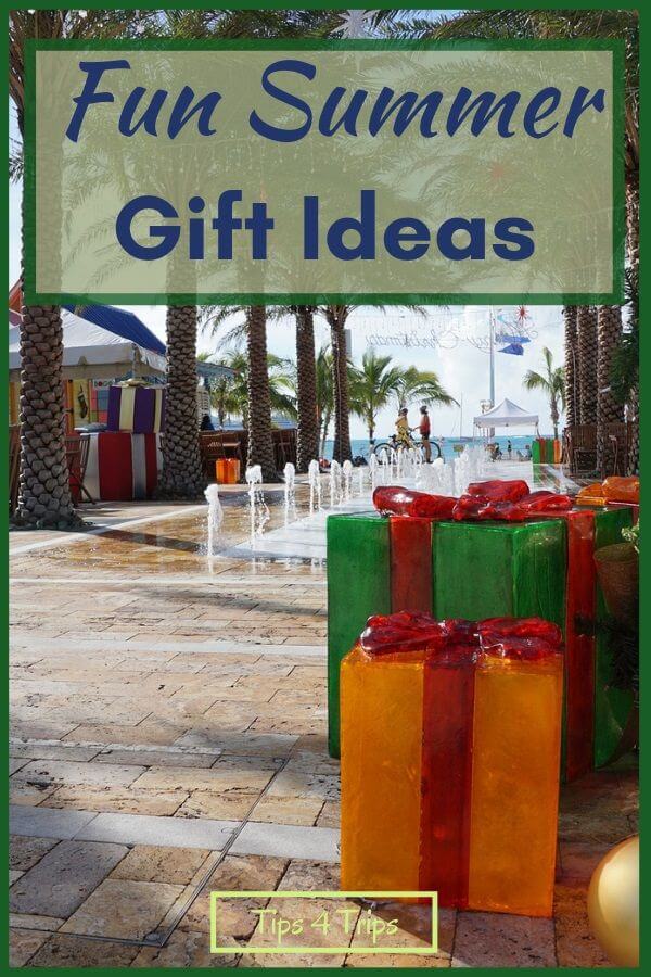 Large presents and wrapped gifts on sidewalk at the beach