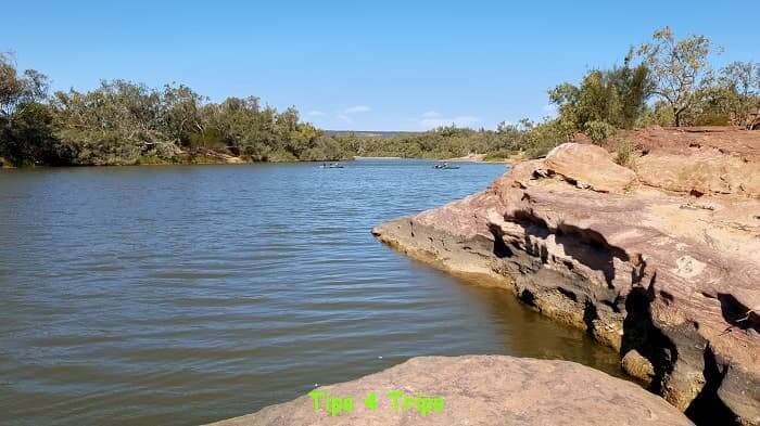 two canoes on the Murchison River bordered by red rocks
