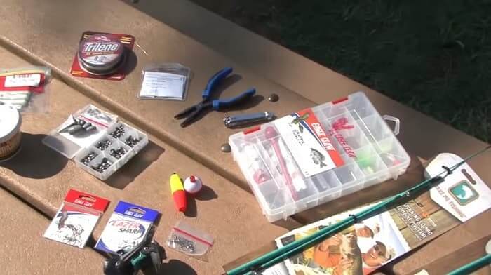 equipment laid out on table for fishing starter kit
