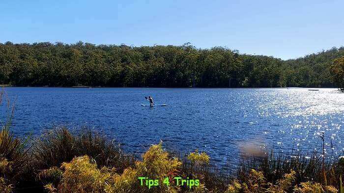 man paddling on Karri Valley Resort lake - Beedalup Lake