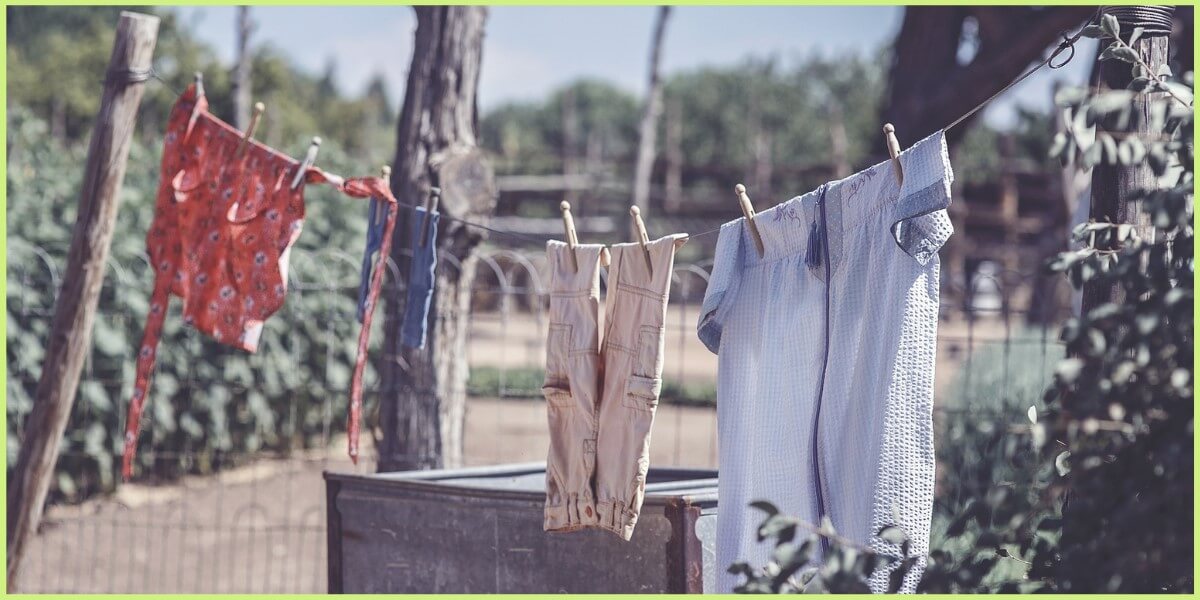 Clothes hanging across a rope in the field